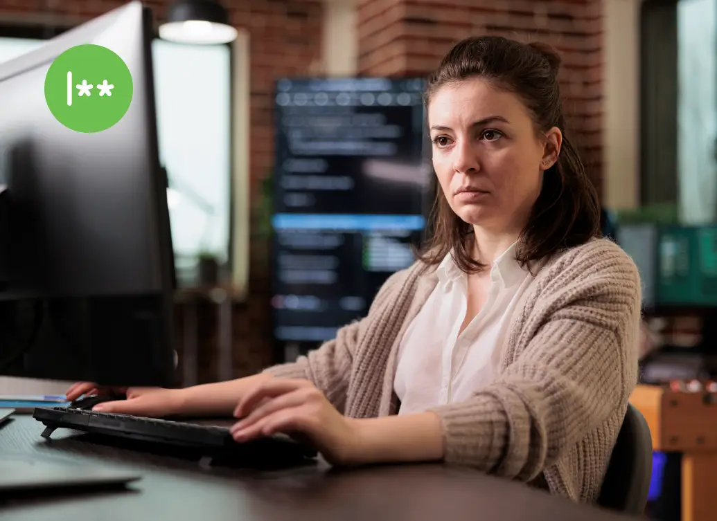 A remote worker showing frustration with password resets looking for a passwordless authentication solution with Duo.