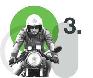 3. A person riding a motorcycle.
