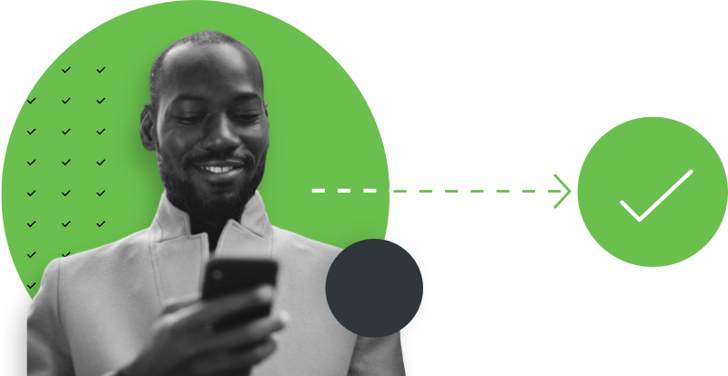A person holding a mobile phone next to a large green checkmark.