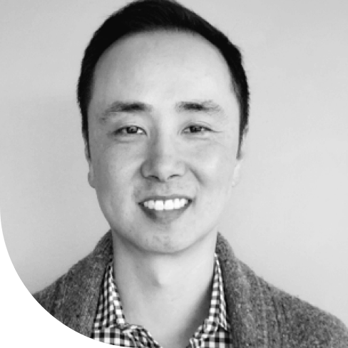 Headshot photo of Chuck Kim, Director of IT at Inflection.