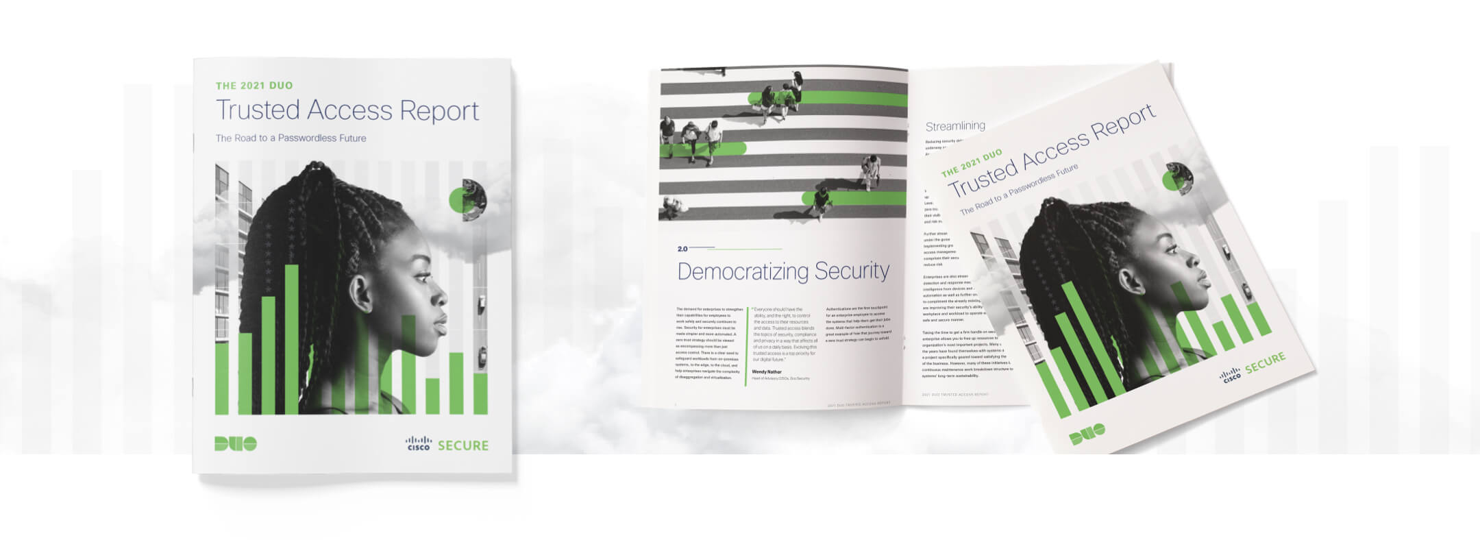 Two hard copies of The 2021 Duo Trusted Access Report closed and opened, featuring  the Democratizing Security chapter