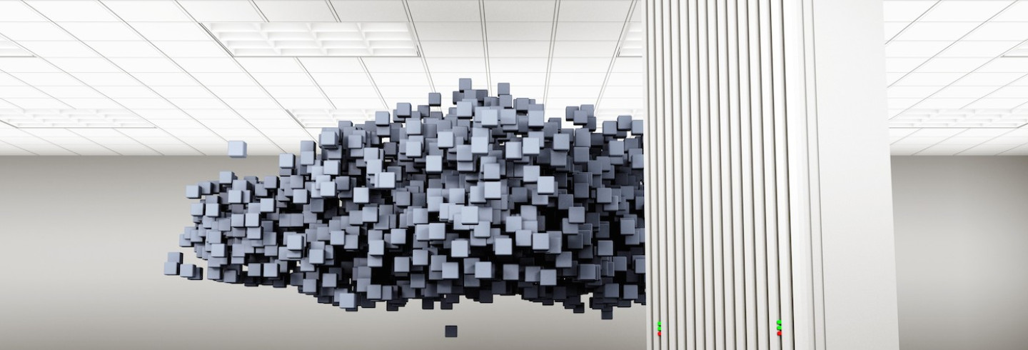 A server as tall as a person stands in front of a cloud made of massive pixels in an office, representing cloud servers.