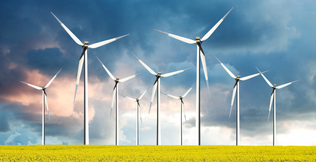 A field of windmills represent the energy industry, which authentication-based attacks targeted.