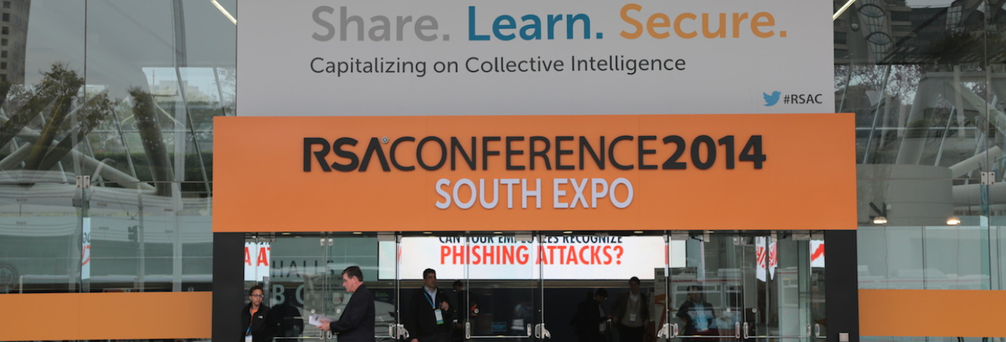 The entrance to the RSA Conference 2014, with a sign that says Share. Learn. Secure: Capitalizing on Collective Intelligence.