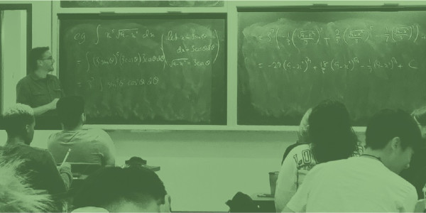 Students in a classroom, overlaid with a color filter of Duo green