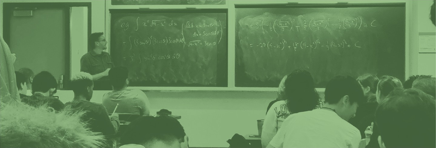 Students in a classroom, overlaid with a color filter of Duo green