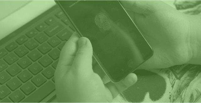 A person uses biometrics on a mobile device, overlaid with a color filter of Duo green