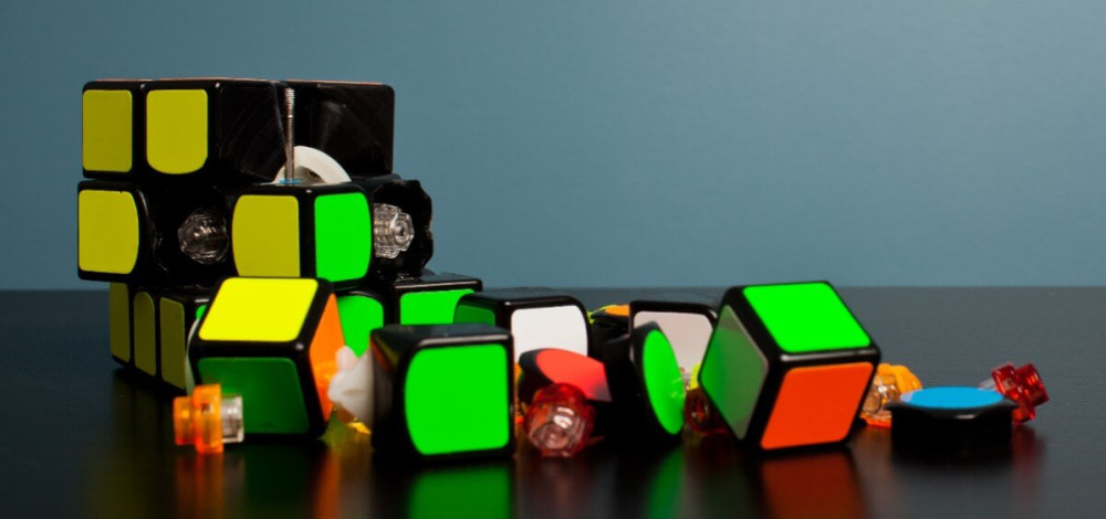 An incomplete Rubik's Cube, with some pieces broken off.